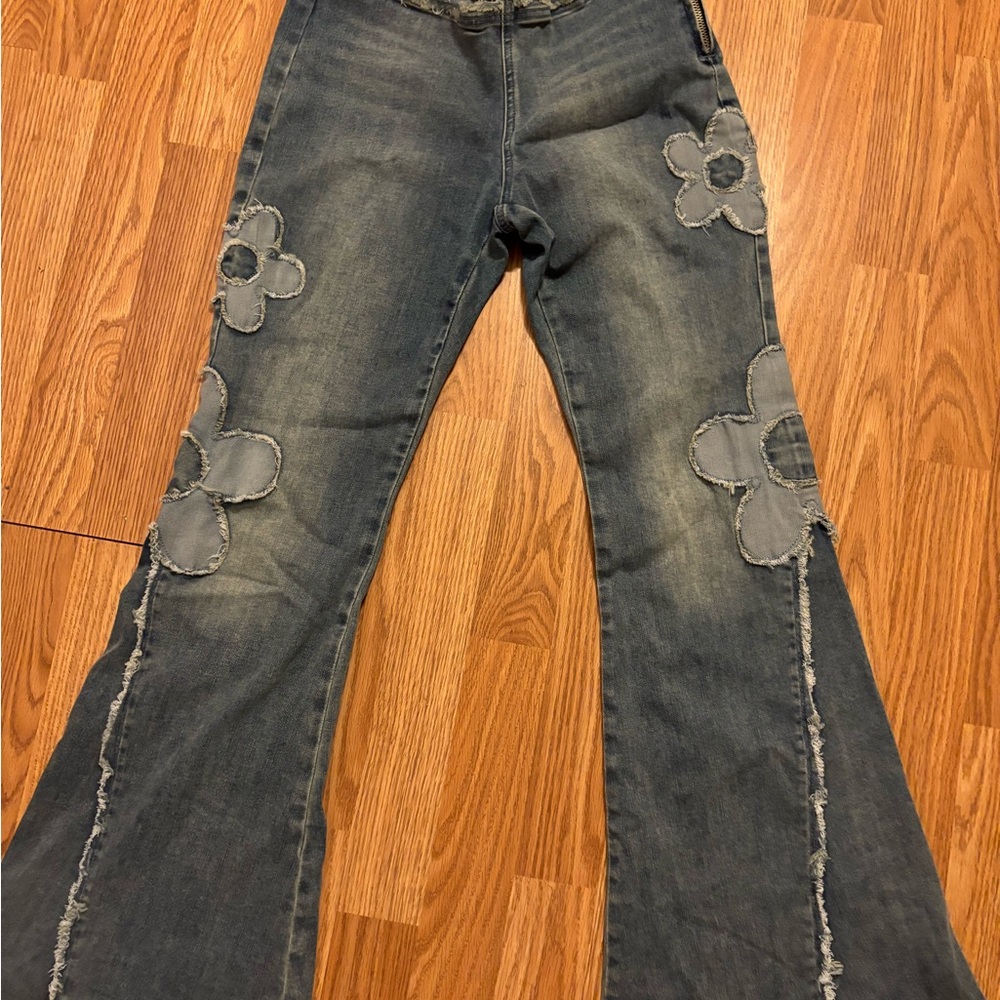 Delia's flower flared jeans